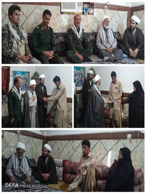 تجلیل از خانواده شهید «محمد مارزی» در شهرستان قلعه گنج