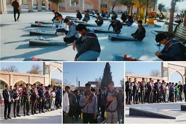 گلباران قبور مطهر شهدا به مناسبت هفته بسیج دانش‌آموزی در شهرستان بافت