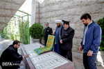 برگزاری مراسم زیارت عاشورا با حضور خادمان حرم رضوی در جوار مقبره الشهدا