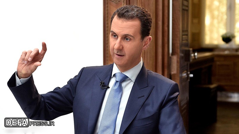 شامی صدر کا فاتحانہ انداز، فرانس کا اعزازی نشان واپس