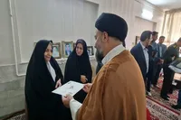 تجلیل مسئولان زارچ از خانواده شهدای دفاع مقدس+ تصاویر