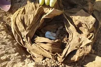 کشف پیکر شهیدی که پوتین‌هایش همچنان در پایش مانده بود+ فیلم