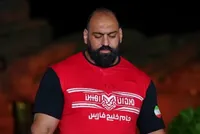قوی‌ترین مرد ایران: برای دفاع از وطن جانم را فدا می‌کنم+ فیلم