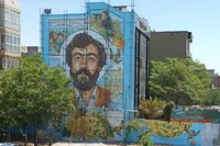 نقاشی دیواری شهید مجید حدادعادل در خیابان آزادی اجرا شد