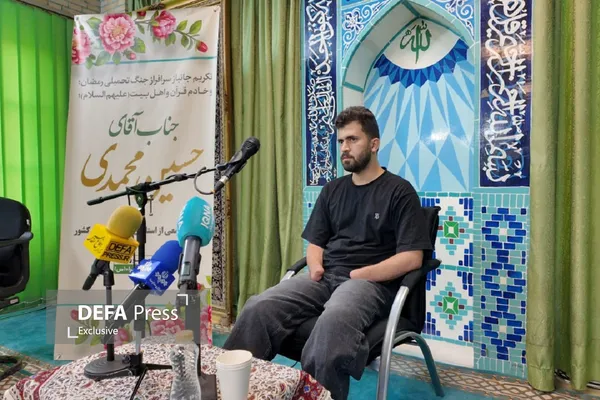 دیدار جامعه قرآنی با جانباز حسین محمدی