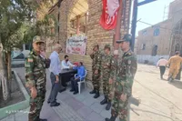 برپایی میز خدمت و ویزیت رایگان پزشکی تیپ ۱۱۶ شهید صفوی در حاشیه نماز جمعه بوئین‌زهرا
