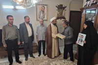 دیدار کارکنان گروه عمران اجتماعی بسیج با خانواده شهید کوهپایه