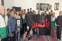 دیدار خادمان ستاد توسعه و بازسازی عتبات عالیات زنجان با خانواده شهید «حسین عسگرلو»