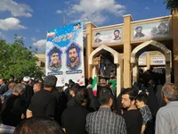 تصاویر/ خاکسپاری دو شهید جنگ سوم در گلزار شهدای روستای فردو
