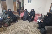 تجلیل از خانواده شهید افضلی در دهه مقاومت