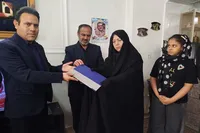تکریم خانواده معظم شهید «امیرحسام انصاری» توسط مدیرکل ورزش و جوانان