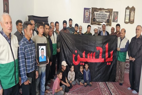 دیدار خادمان ستاد توسعه و بازسازی عتبات عالیات زنجان با خانواده شهید «حسین عسگرلو»