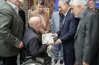 تصاویر/ تجلیل از خانواده های معظم شهدا، رزمندگان و فرماندهان دفاع مقدس