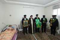 تصاویر/ عیادت خادمان حرم حضرت معصومه(س) از جانباز قطع نخاع جنگ رمضان