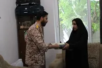 تجلیل مدیرکل حفظ آثار و نشر ارزش‌های دفاع مقدس استان از خانواده شهید «حسین شاهین شمس‌آبادی»